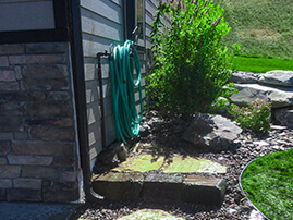 Landscaping Flagstone Garden Hose Area