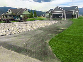 Rock Area Installation Around Driveway